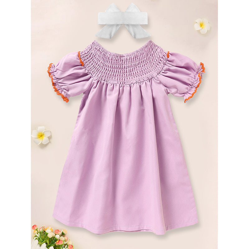 A Cute Embroidered Dress For A Baby Girl
